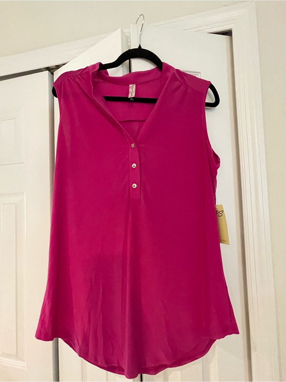 Pink woman’s sleeveless top